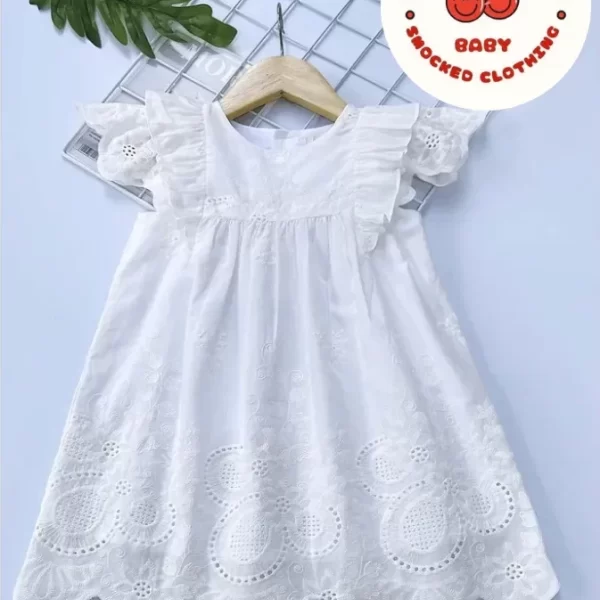 White machine embroidered dress