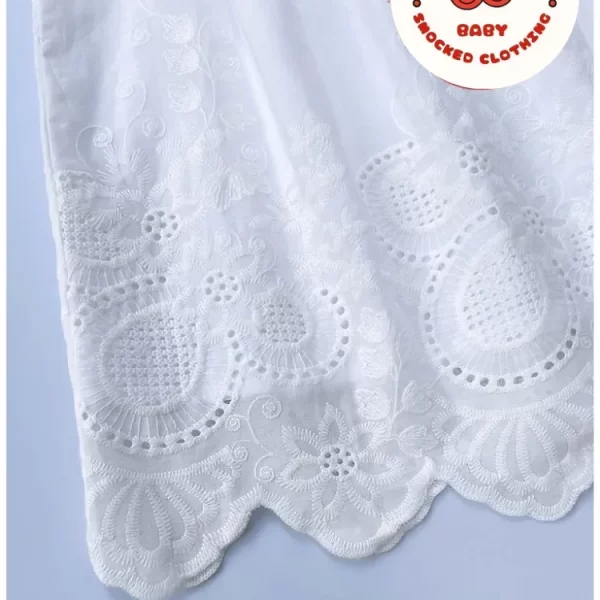 White machine embroidered dress