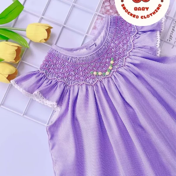 Purple smocked bishop dress with small flower pattern
