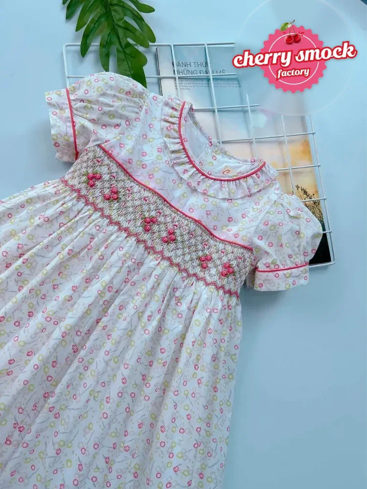Wholesale smocked clothing Australia: white and pink flower smocked princess dress from Cherrysmock