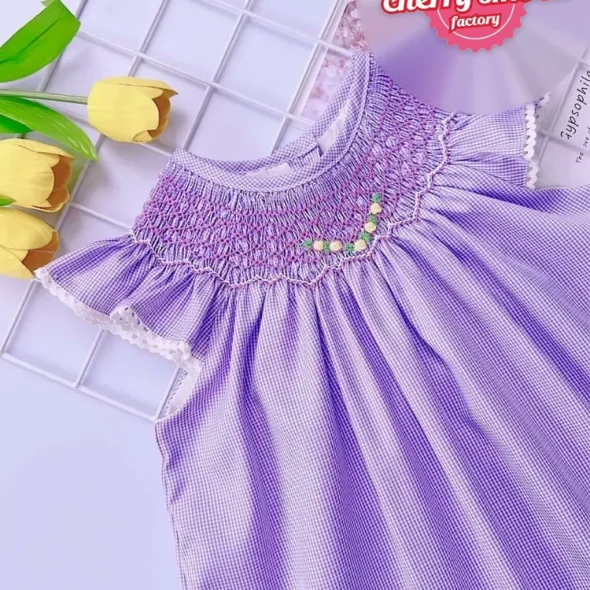 Purple smocked bishop dress with small flower pattern