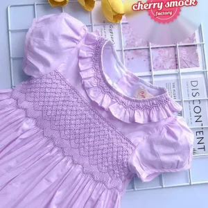 Pink geometric smocked princess dress