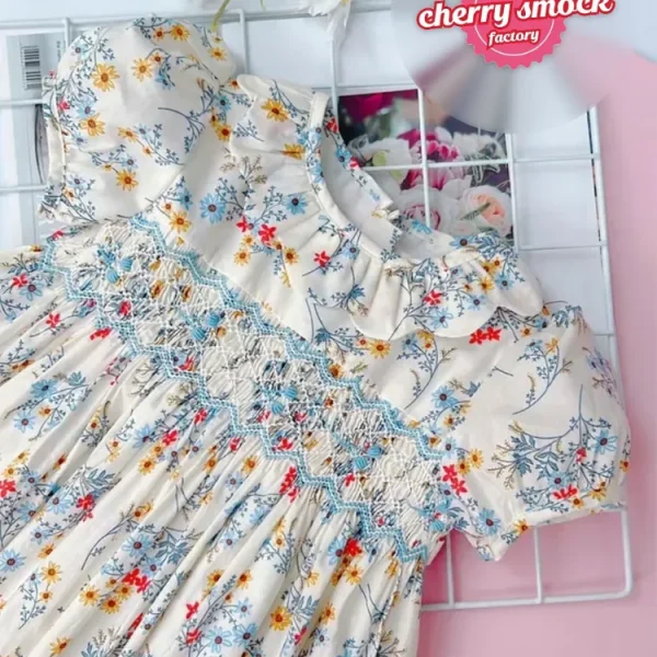 Princess smocked dress with chrysanthemum pattern