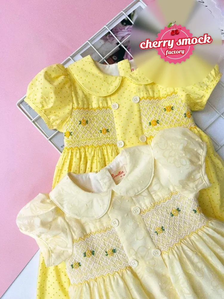 Hand smocked yellow chrysanthemum princess dress for girls from Cherrysmock
