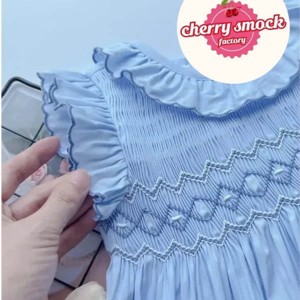 Blue geometric smocked sundress for girls