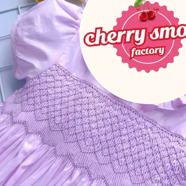 Pink geometric smocked princess dress