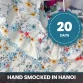 Chrysanthemum smocked princess dress hand made in Hanoi with a 20 day lead time