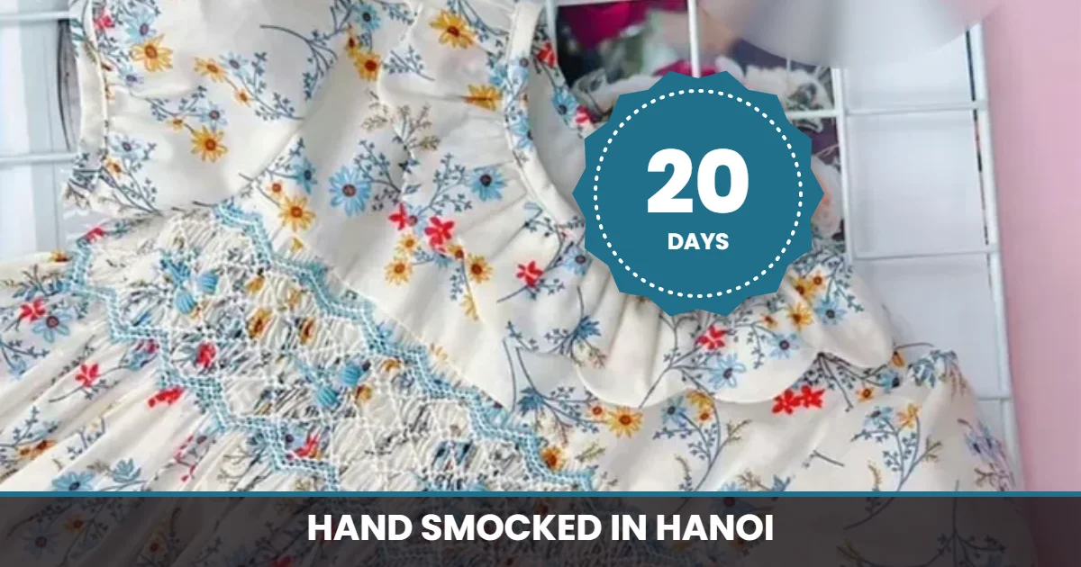 Chrysanthemum smocked princess dress hand made in Hanoi with a 20 day lead time