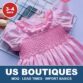 Pink hand-smocked girls dress from Cherrysmock for US boutique wholesale orders